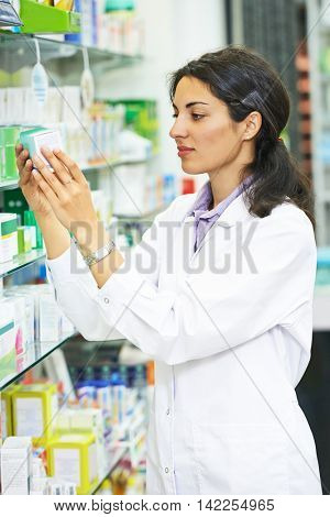 Pharmacutical chemist in drugstore