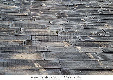 destroyed rubber coating. incorrectly installed rubber flooring of children playground or running track of stadium. the concept of low-quality work