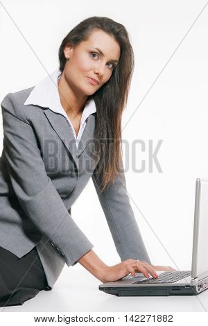 Young beautiful young woman working with laptop