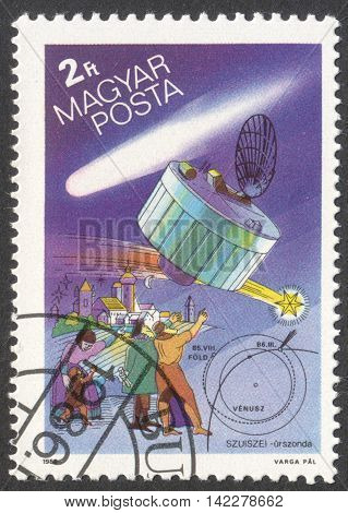MOSCOW RUSSIA - CIRCA MAY 2016: a post stamp printed in HUNGARY shows a space ship and a comet the series 