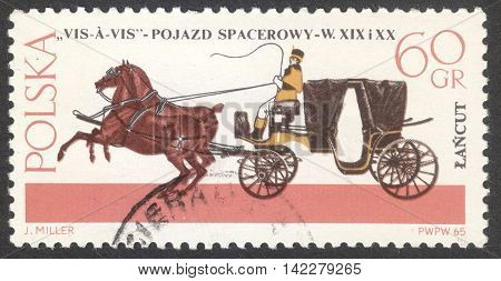 MOSCOW RUSSIA - CIRCA MAY 2016: a post stamp printed in POLAND shows a Vis-a-vis coach the series 