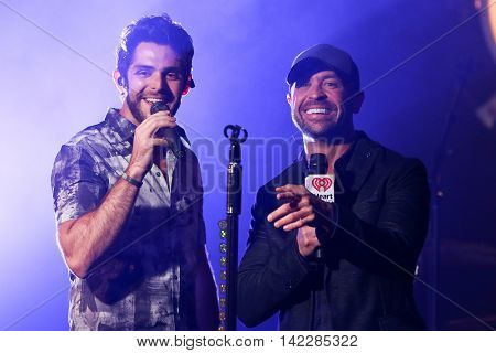 NEW YORK-SEPT 28: Singer Thomas Rhett (L) and radio host Cody Alan at the iHeartRadio Album Release Party with Thomas Rhett on September 28, 2015 at the iHeartRadio Theater in New York City.