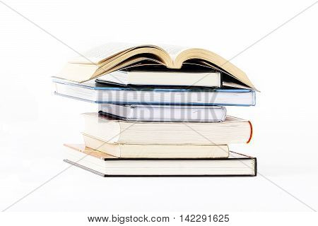 Pile of books on a white background