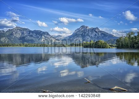 An image of a view to Neuschwanstein at Forggensee lake