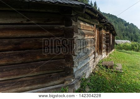 Ancient Hutsul farmstead grazhda. It includes accommodations outbuildings and fenced yard.