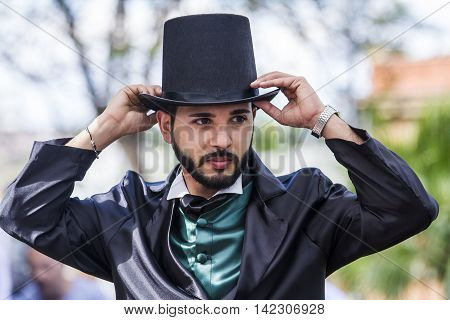 CAGLIARI, ITALY - June 1, 2014: Sunday at La Grande Jatte public gardens - Sardinia - portrait of a man in Victorian costumes