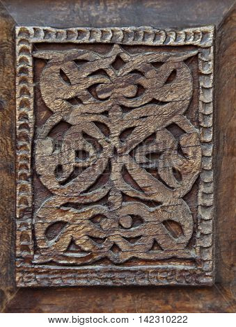 Close-up of a traditional carved wooden door, Uzbekistan