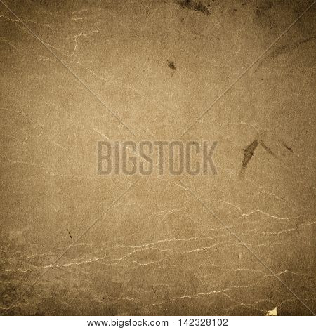 Aged dirty paper background. Natural old paper texture for the design.