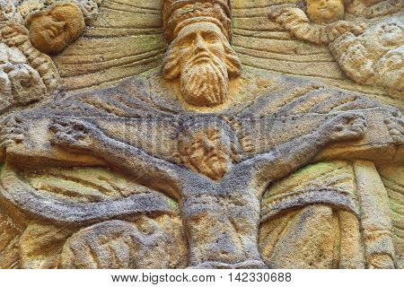 Stone altar carved in sandstone cliff - Jesus on the Cross