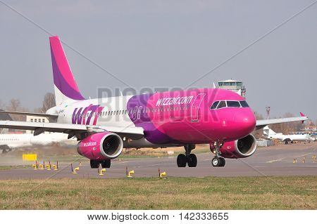 Kiev Ukraine - April 14 2012: Wizz Air Airbus A320 is taxiing to the runway in the airport
