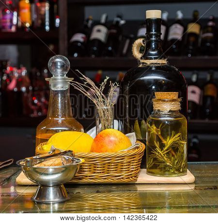 still lifel tools on the bar the bottle in the blurred background warm light