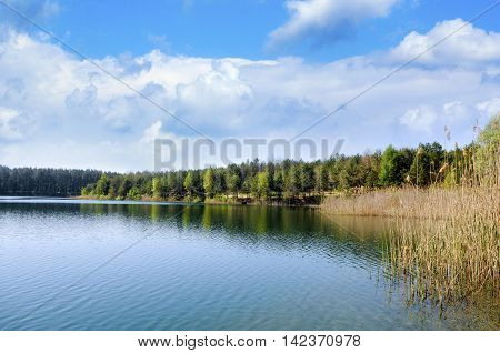Beautiful autumn Alpine  lake and forest landscape