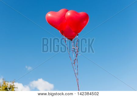 Valentine heart balloon against blue sky background