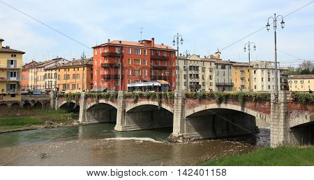 PARMA, ITALY - APRIL 1, 2014: City of Parma and river on April 1, 2014 in Parma, Italy. Parma is a popular unesco world heritage city in the province of Emilia-Romagna.