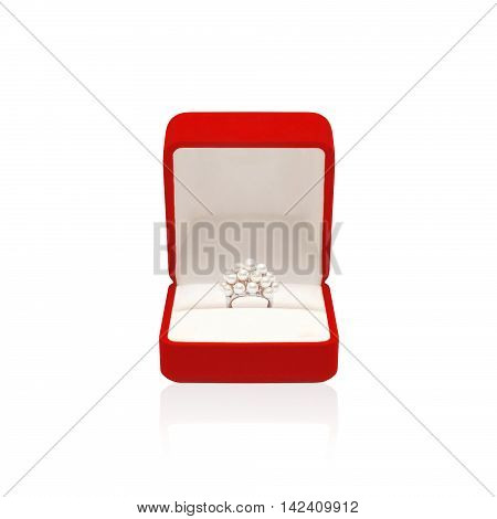 Luxury ring with pearl in red box isolated on a white background