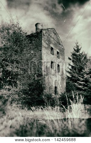 Old abandoned haunted house in grunge style