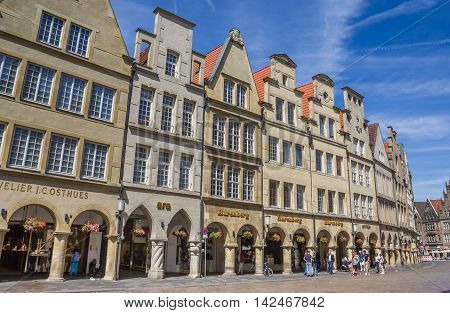 MUNSTER, GERMANY - AUGUST 7, 2016: Shops at the historical Prinzipal market square in Munster, Germany