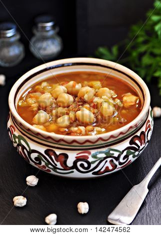 Moroccan harira soup in traditional bowls. soup
