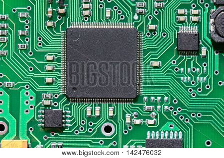 Close up a micro chip on an electronic board