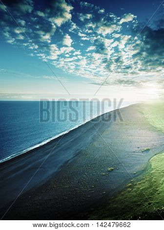 the black sand beach from the cliff of Dyrholaeyjarviti, Iceland