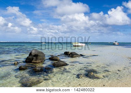 BEL OMBRE, MAURITIUS ISLAND - JUNE 16, 2016: Diving boats in Bel Ombre rocky beach, Mauritius island, June 16, 2016