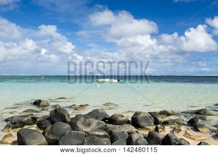 BEL OMBRE, MAURITIUS ISLAND - JUNE 16, 2016: Diving boats in Bel Ombre rocky beach, Mauritius island, June 16, 2016