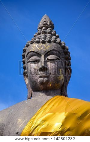 buddha statue and blue sky in thailand