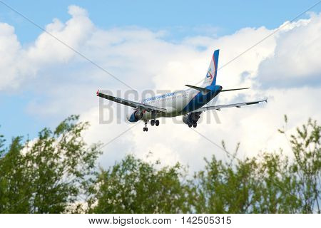 ST. PETERSBURG, RUSSIA - MAY 17, 2016: Airbus A320-214 (VQ-BDM) airlines Ural Airlines landing in Pulkovo airport