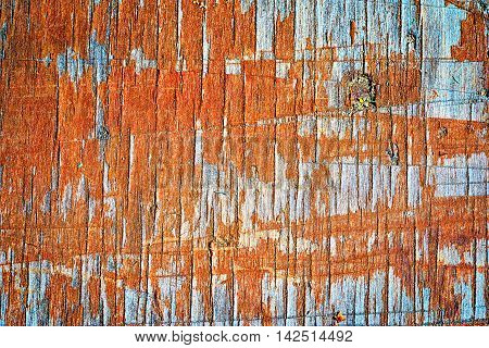 Old Wooden Flaky Orange Painted Board With Lots Of Notchings, Background