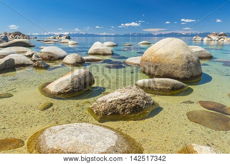 Beautiful boulders and crystal clear water of the lake Tahoe. Hidden Beach, Lake Tahoe - Nevada, USA