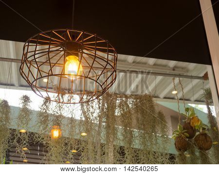 Edison's light bulb and lamp in modern style. Warm tone light bulb lamp. Lamps in coffee shop.