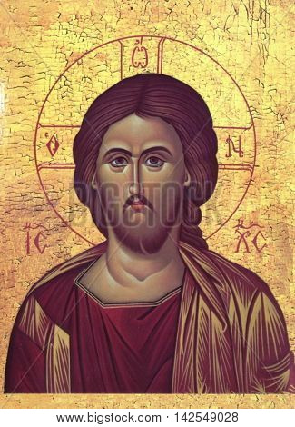 Icon of Jesus Christ on a yellow background