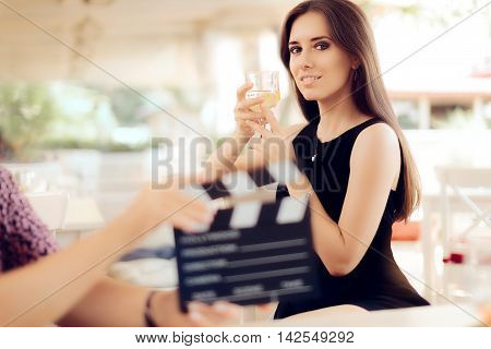 Happy Actress Holding a Glass in Movie Scene