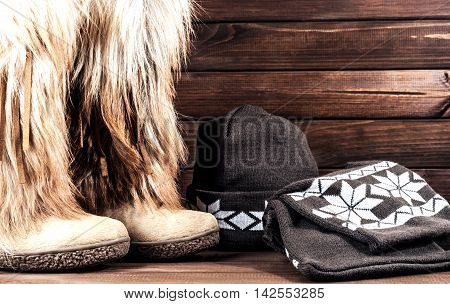 Stylish women's winter boots with fur scarf and hat