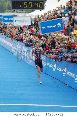 STOCKHOLM - JUL 02 2016: Running triathlete Jonathan Brownlee (GBR) on the second place at the finish in the Men's ITU World Triathlon series event July 02 2016 in Stockholm Sweden