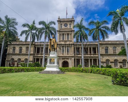 HONOLULU, HI - AUG 6: King Kamehameha I Statue, by Thomas Gould, on August 6, 2016 in Honolulu, Hawaii. It is in front of Ali iolani Hale, the Hawaii Supreme Court Building on King Street in Honolulu.