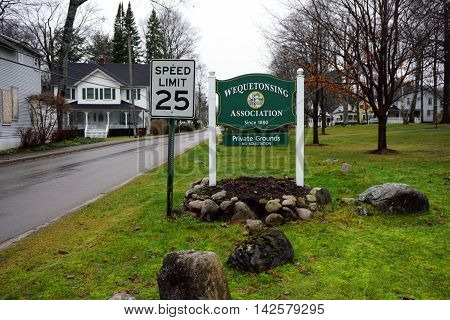WEQUETONSING, MICHIGAN / UNITED STATES - DECEMBER 22, 2015: A sign indicates that soliciting is prohibited on the private grounds of the Wequetonsing Association.