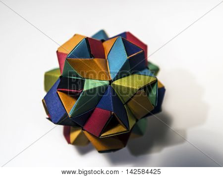origami paper composition white background studio closeup