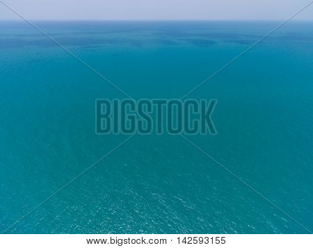 the surface of the water, turquoise in color with bird's eye