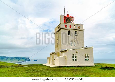 Lighthouse at the cape Dyrholaey near the village of Vik in Iceland