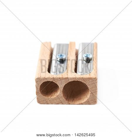 Wooden pencil sharpener isolated over the white background