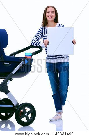 Full length portrait of a mother with a stroller holding blank, isolated on white background