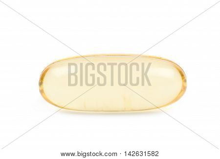 Single yellow softgel pill isolated over the white background