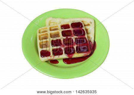 Viennese waffles with sweet jam on a plate - isolated on a white background.
