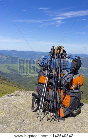 Camping with backpacks in the mountains with views of the mounta
