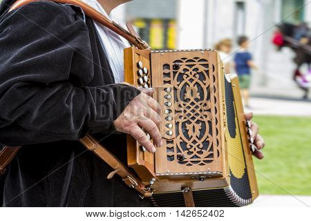 SELARGIUS, ITALY - September 13, 2015: Former marriage Selargino - Sardinia - detail of an accordion with keyboard buttons