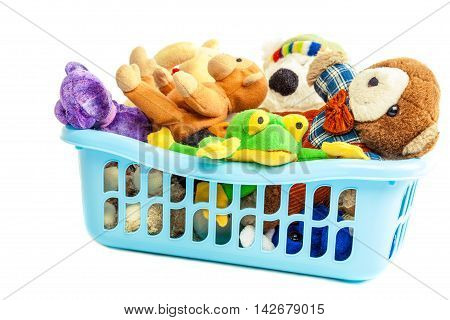 Soft toys in a plastic container isolated on white background.