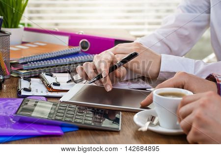Hands in the office in combination with subjects to do business