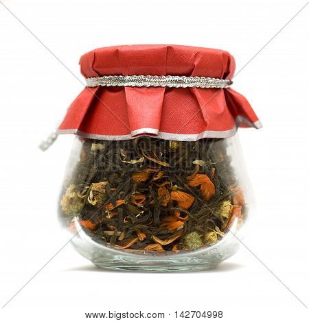 Herbal tea in glass jar isolated over white