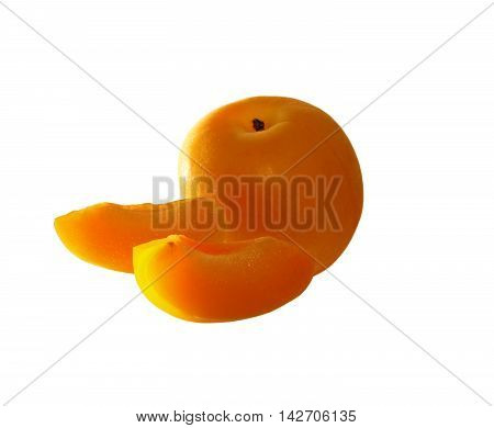 Apricot and small pieces of fruits on an isolated background